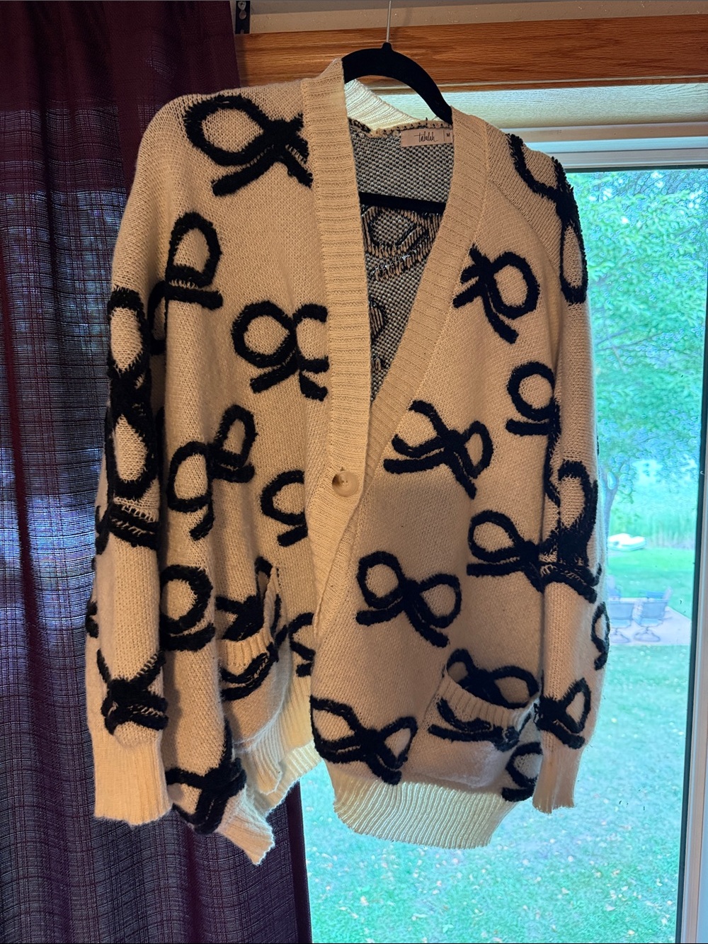 Shop Talulah cozy Cozy Cream Cardigan Sweater with Black bows